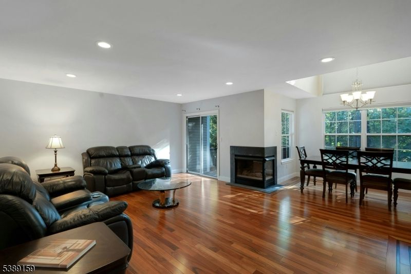Chandelier, Dining room, Fireplace, Interior, Living room, Recessed Lighting, Wood Texture Flooring
