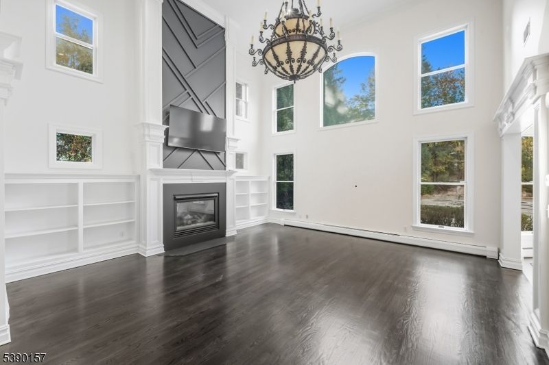 Chandelier, Empty room, Fireplace, Interior, Wood Texture Flooring