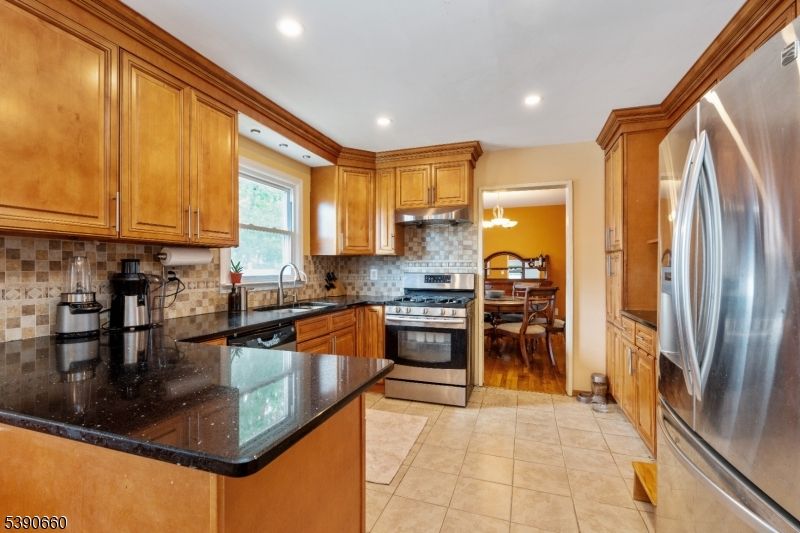 Dining room, Interior, Kitchen, Recessed Lighting, Stainless Steel Appliances, Wood Texture Flooring