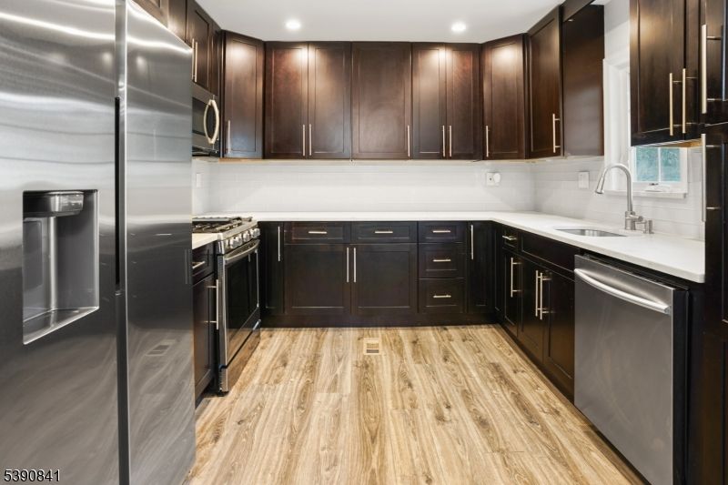 Interior, Kitchen, Recessed Lighting, Stainless Steel Appliances, Wood Texture Flooring
