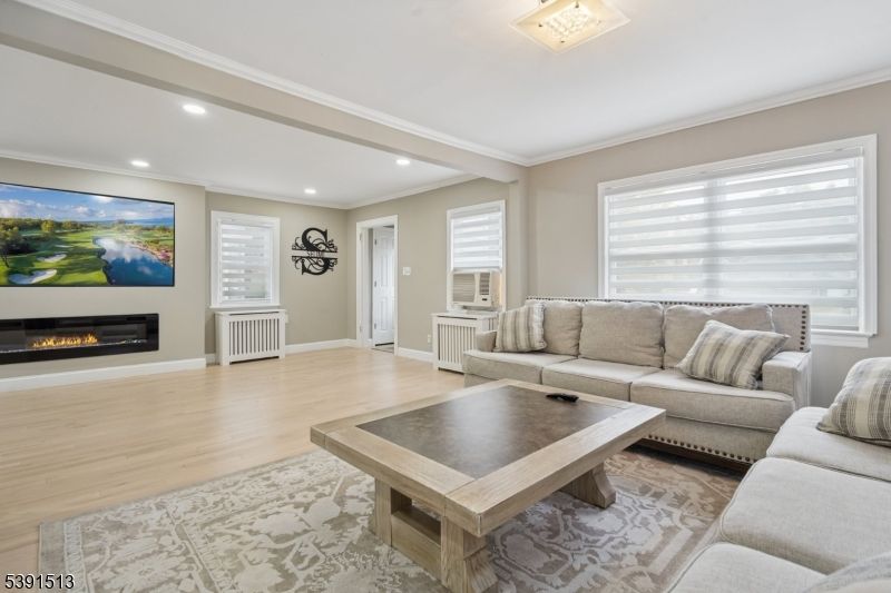 Fireplace, Interior, Living room, Recessed Lighting, Wood Texture Flooring