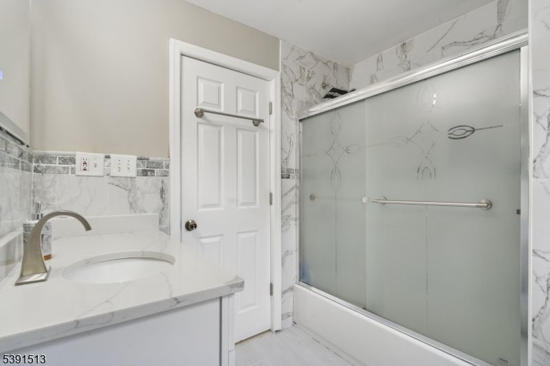 Bathroom, Glass Shower, Interior, Marble Walls, Wood Texture Flooring