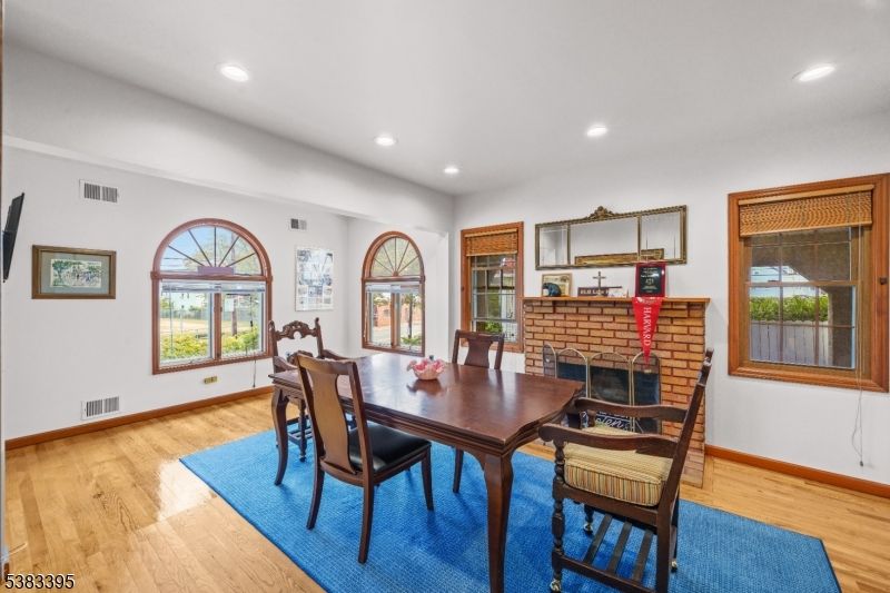 Dining room, Fireplace, Interior, Recessed Lighting, Wood Texture Flooring