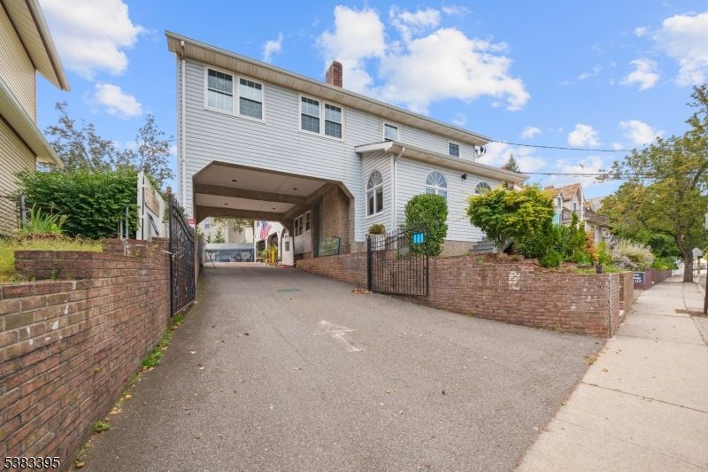 Attached, Exterior, Facade, Brick Facade, None