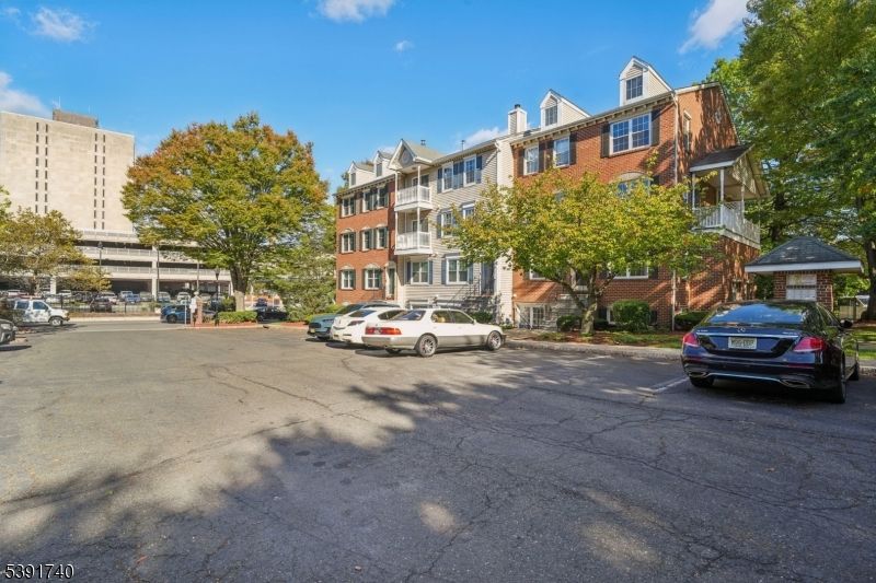 Exterior, Facade, Brick Facade, Condo Building