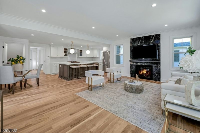 Dining room, Fireplace, Interior, Kitchen, Living room, Pendant Lights, Recessed Lighting, Wood Texture Flooring