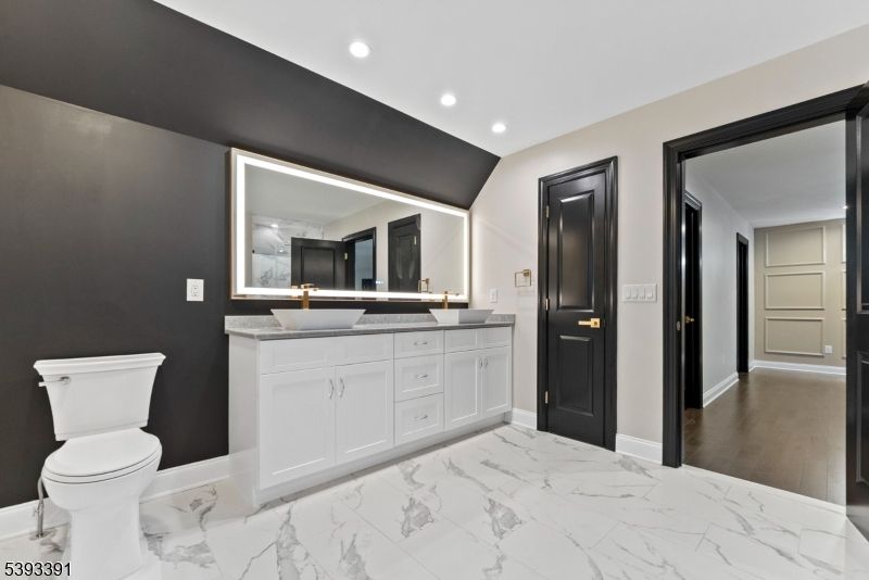 Bathroom, Dual Sink Vanities, Interior, Marble, Recessed Lighting, Wood Texture Flooring