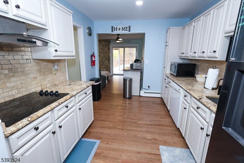 Interior, Kitchen, Pendant Lights, Recessed Lighting, Stone Walls, Wood Texture Flooring