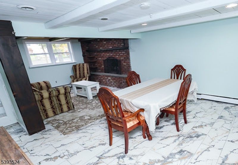 Dining room, Fireplace, Interior, Marble, Recessed Lighting, Stone Walls