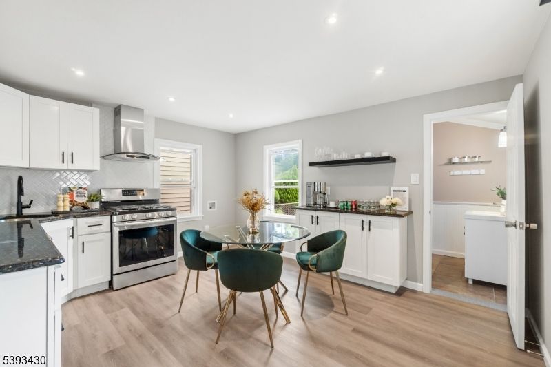 Dining room, Interior, Kitchen, Recessed Lighting, Stainless Steel Appliances, Wood Texture Flooring