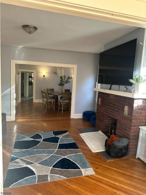 Dining room, Fireplace, Interior, Stone Walls, Wood Texture Flooring