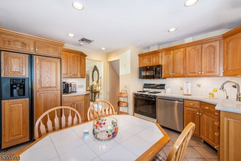 Dining room, Interior, Kitchen, Recessed Lighting, Stainless Steel Appliances, Tile Countertops