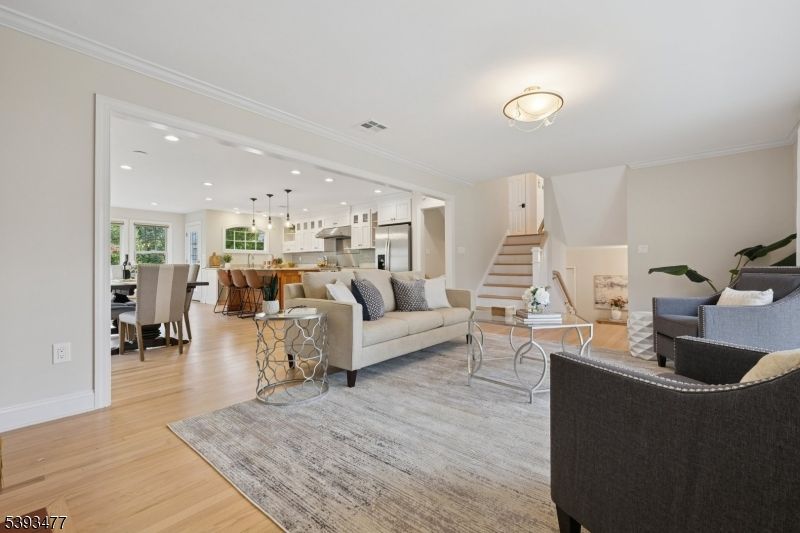 Dining room, Interior, Kitchen, Living room, Pendant Lights, Recessed Lighting, Stainless Steel Appliances, Wood Texture Flooring