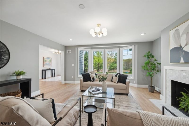 Chandelier, Fireplace, Interior, Living room, Recessed Lighting, Wood Texture Flooring