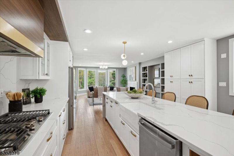 Dining room, Interior, Kitchen, Pendant Lights, Recessed Lighting, Stainless Steel Appliances, Wood Texture Flooring