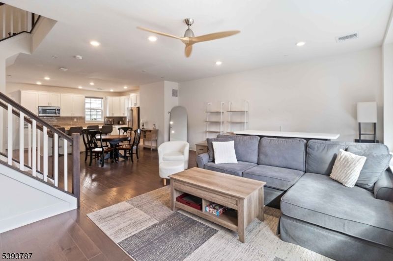 Dining room, Interior, Kitchen, Living room, Recessed Lighting, Stainless Steel Appliances, Wood Texture Flooring