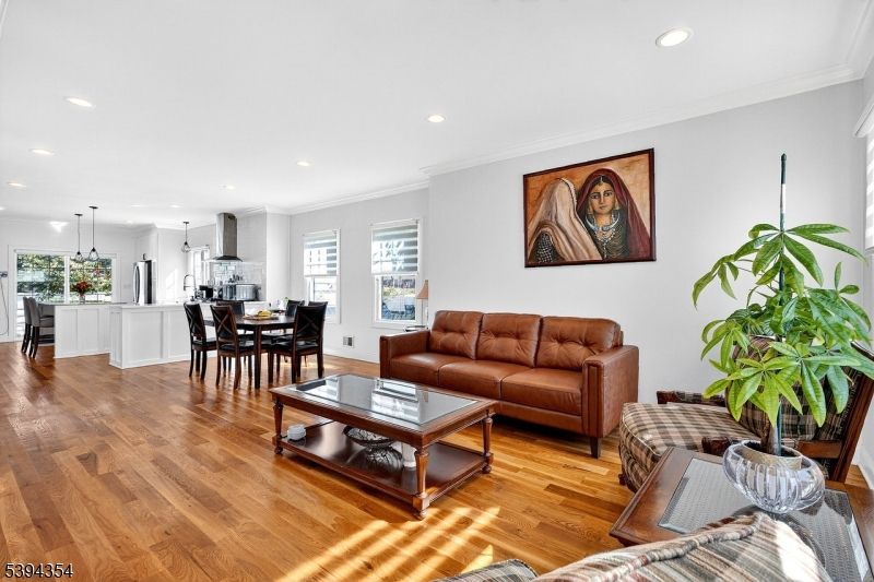 Dining room, Interior, Kitchen, Living room, Pendant Lights, Recessed Lighting, Stainless Steel Appliances, Wood Texture Flooring