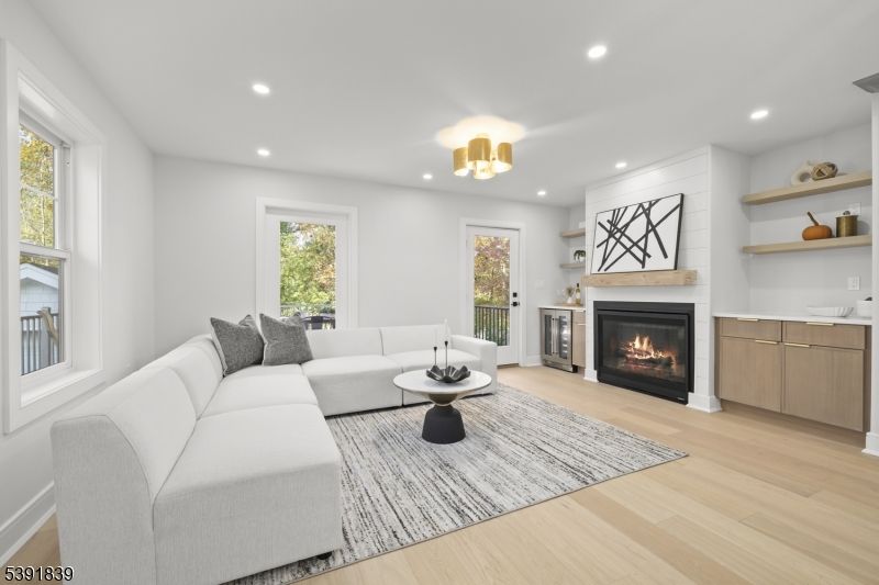 Fireplace, Interior, Living room, Recessed Lighting, Wood Texture Flooring