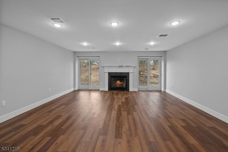 Empty room, Fireplace, Interior, Recessed Lighting, Wood Texture Flooring