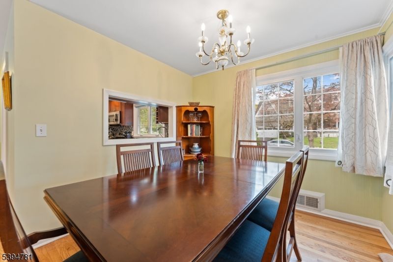 Chandelier, Dining room, Interior, Wood Texture Flooring