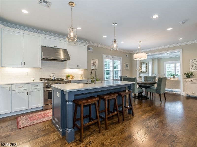 Dining room, Interior, Kitchen, Pendant Lights, Recessed Lighting, Stainless Steel Appliances, Wood Texture Flooring