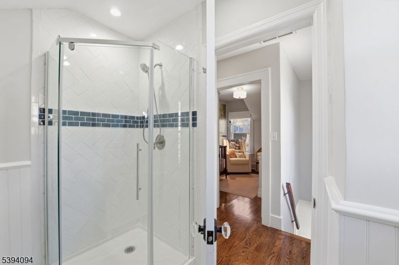 Bathroom, Glass Shower, Interior, Marble Walls, Recessed Lighting, Wood Texture Flooring