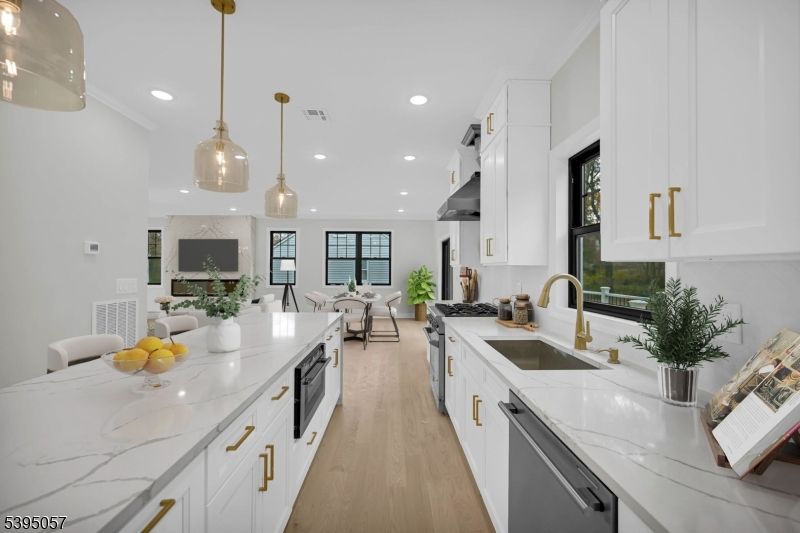 Dining room, Interior, Kitchen, Living room, Pendant Lights, Recessed Lighting, Stainless Steel Appliances, Wood Texture Flooring