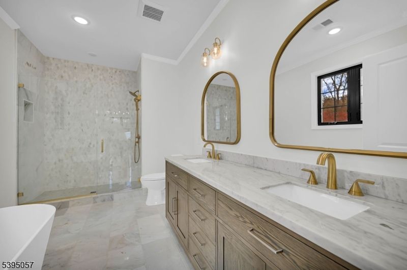 Bathroom, Dual Sink Vanities, Glass Shower, Interior, Marble, Marble Walls, Recessed Lighting