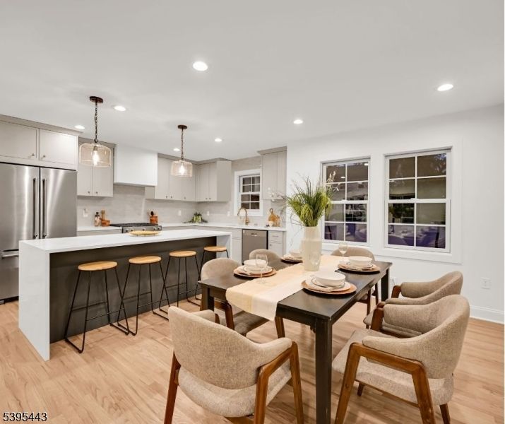 Dining room, Interior, Kitchen, Pendant Lights, Recessed Lighting, Stainless Steel Appliances, Wood Texture Flooring