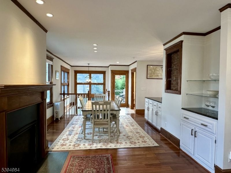 Dining room, Fireplace, Interior, Pendant Lights, Recessed Lighting, Wood Texture Flooring