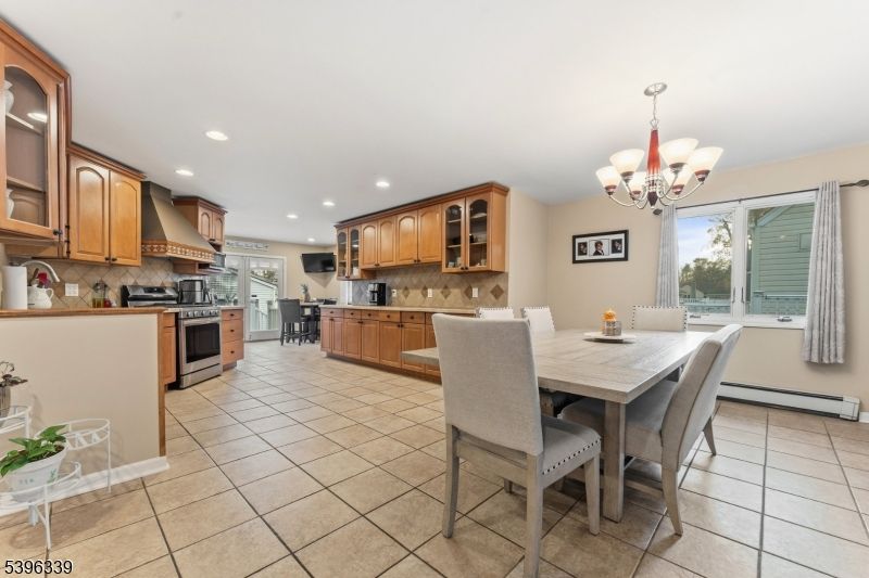 Chandelier, Dining room, Interior, Kitchen, Recessed Lighting, Stainless Steel Appliances