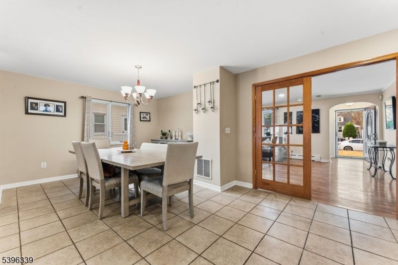 Chandelier, Dining room, Interior, Wood Texture Flooring