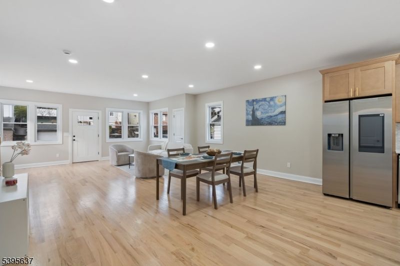 Dining room, Interior, Living room, Recessed Lighting, Stainless Steel Appliances, Wood Texture Flooring
