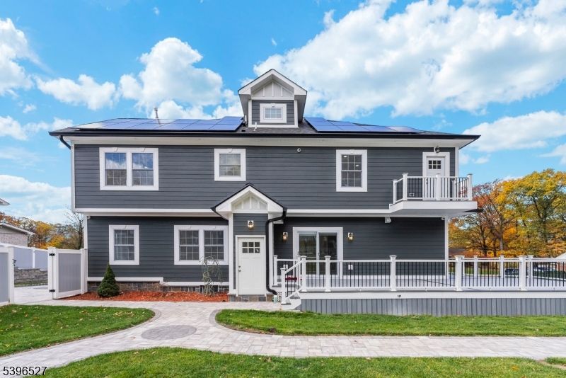 Exterior, Facade, Solar Panels, Raised Ranch