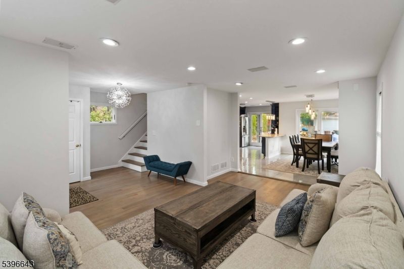 Chandelier, Dining room, Interior, Living room, Recessed Lighting, Wood Texture Flooring