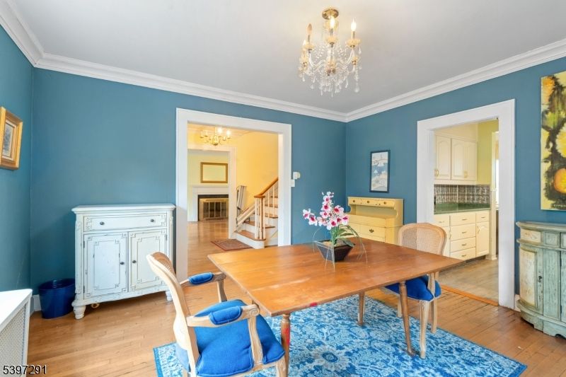 Chandelier, Dining room, Fireplace, Interior, Wood Texture Flooring