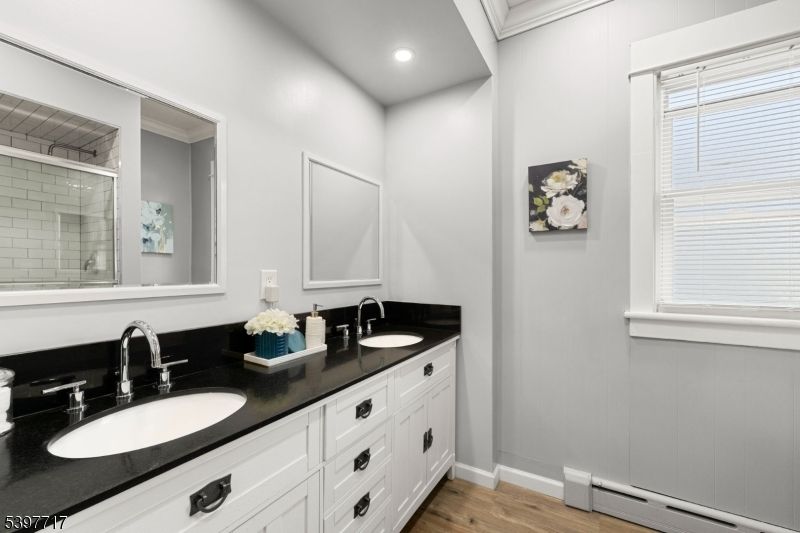 Bathroom, Dual Sink Vanities, Interior, Recessed Lighting, Wood Texture Flooring