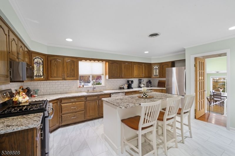 Interior, Kitchen, Marble, Recessed Lighting, Stainless Steel Appliances, Wood Texture Flooring