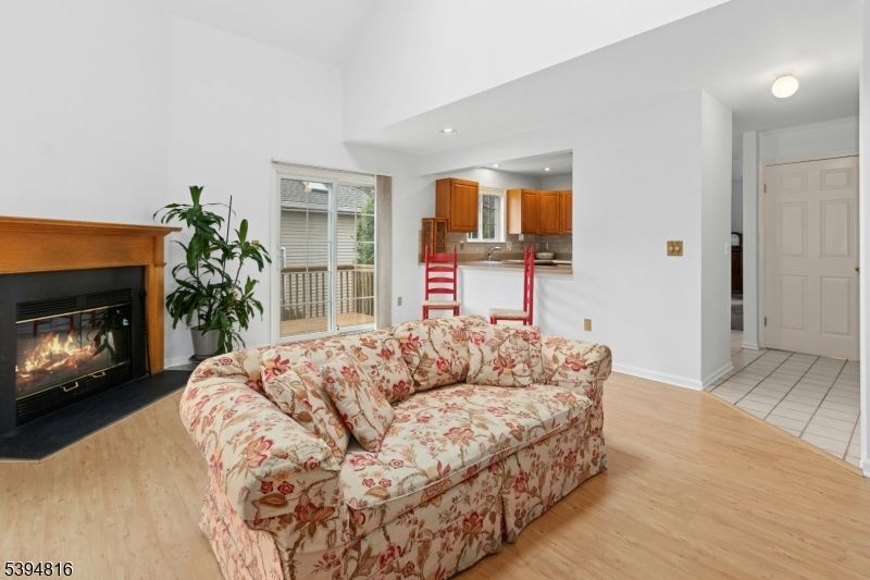 Fireplace, Interior, Kitchen, Living room, Recessed Lighting, Wood Texture Flooring