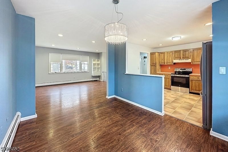 Chandelier, Interior, Kitchen, Recessed Lighting, Stainless Steel Appliances, Wood Texture Flooring