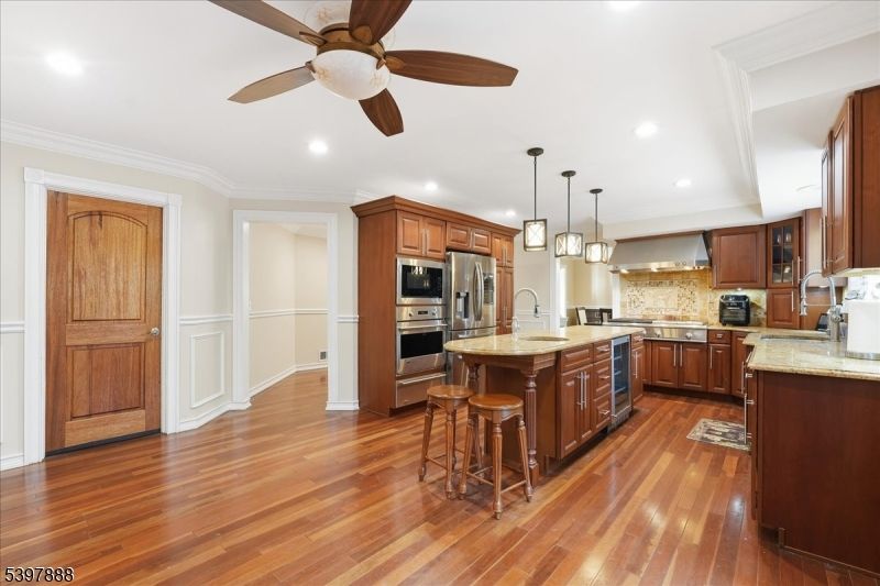 Interior, Kitchen, Pendant Lights, Recessed Lighting, Stainless Steel Appliances, Wood Texture Flooring