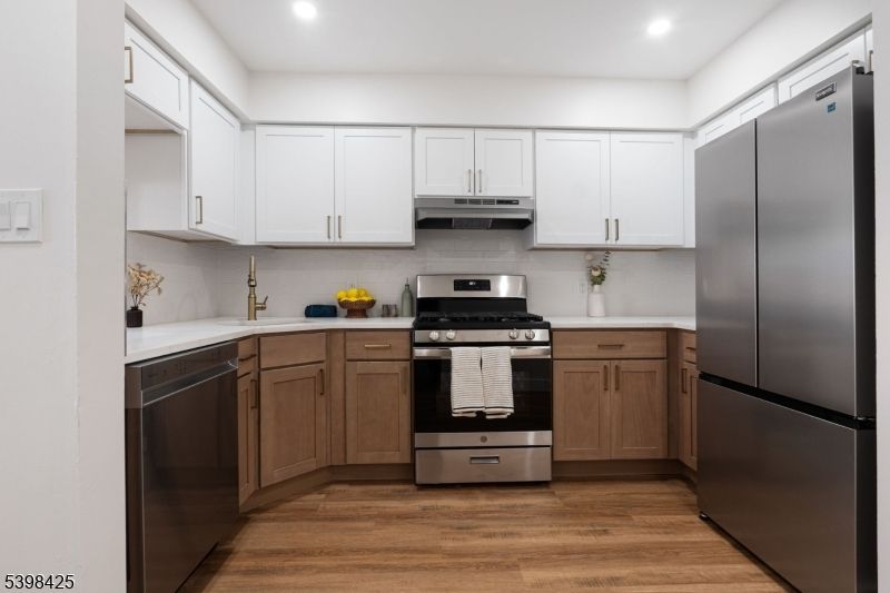 Interior, Kitchen, Recessed Lighting, Stainless Steel Appliances, Wood Texture Flooring
