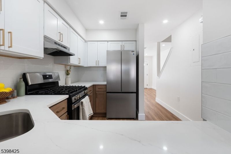 Interior, Kitchen, Recessed Lighting, Stainless Steel Appliances, Wood Texture Flooring