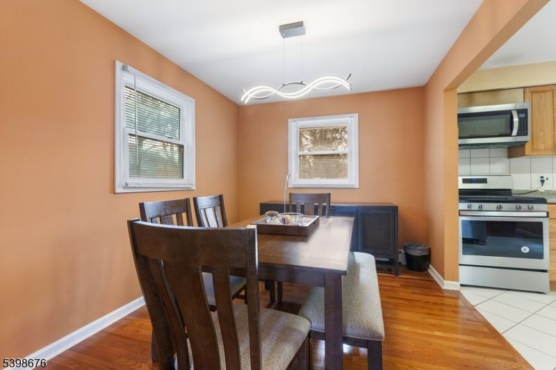 Dining room, Interior, Kitchen, Pendant Lights, Stainless Steel Appliances, Wood Texture Flooring