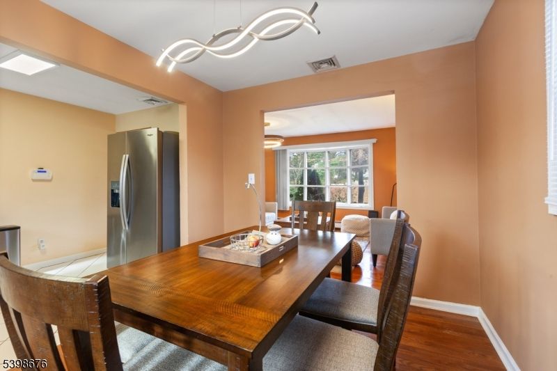 Dining room, Interior, Kitchen, Pendant Lights, Stainless Steel Appliances, Wood Texture Flooring