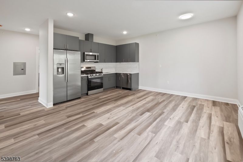 Interior, Kitchen, Recessed Lighting, Stainless Steel Appliances, Wood Texture Flooring