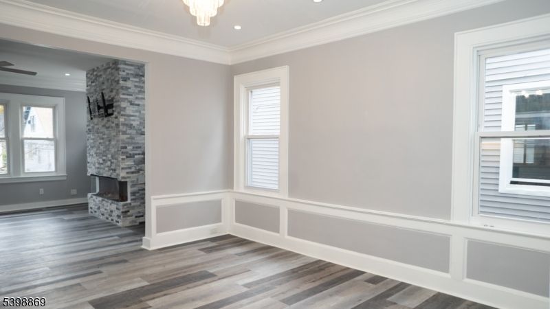 Empty room, Fireplace, Interior, Pendant Lights, Recessed Lighting, Wood Texture Flooring