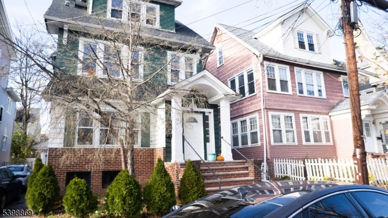 Exterior, Facade, Brick Facade, American Foursquare