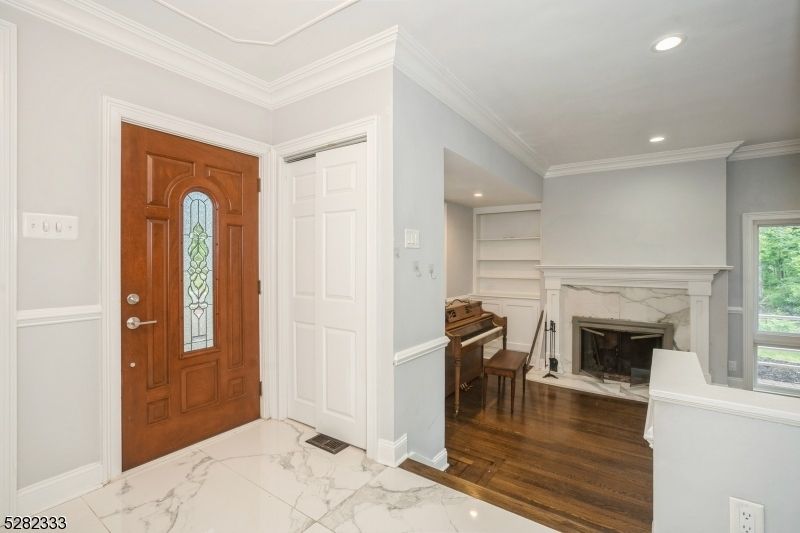 Fireplace, Interior, Marble, Piano, Recessed Lighting, Wood Texture Flooring