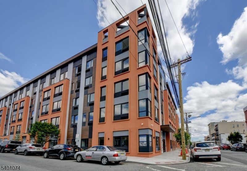 Exterior, Facade, Brick Facade, Condo Building